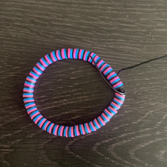 Three handmaid clay bead bracelets. - Picture 3 of 4